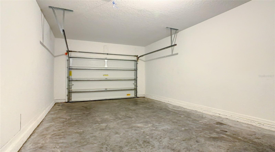 High Ceilings In Garage To Hang Storage Racks!