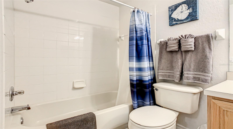 Shower In Tub In This Bathroom