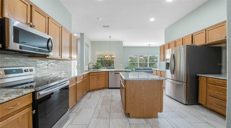 Spacious Kitchen With Stainless Steel Appliances.