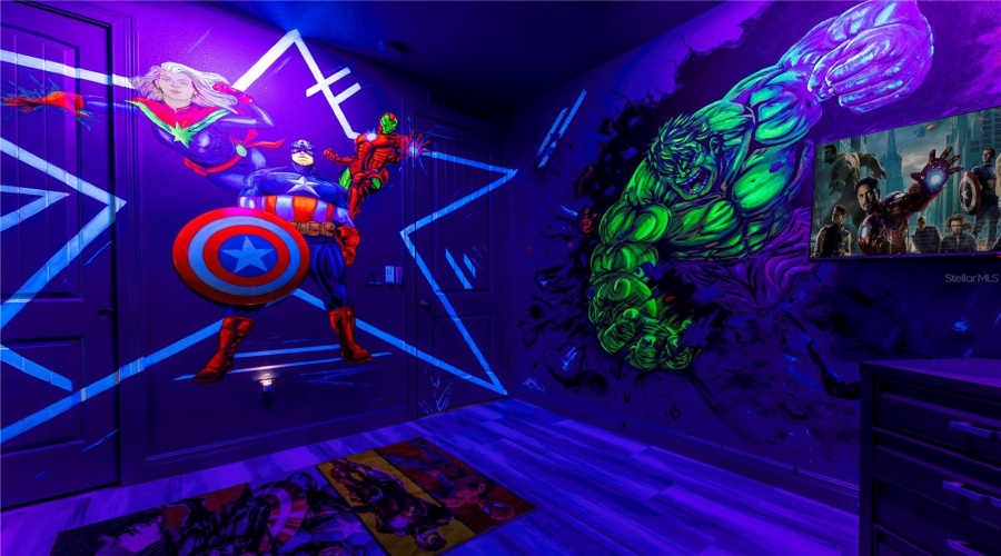 Avengers Themed Guest Bedroom With Bunkbed And Custom Black Light Reactive Murals
