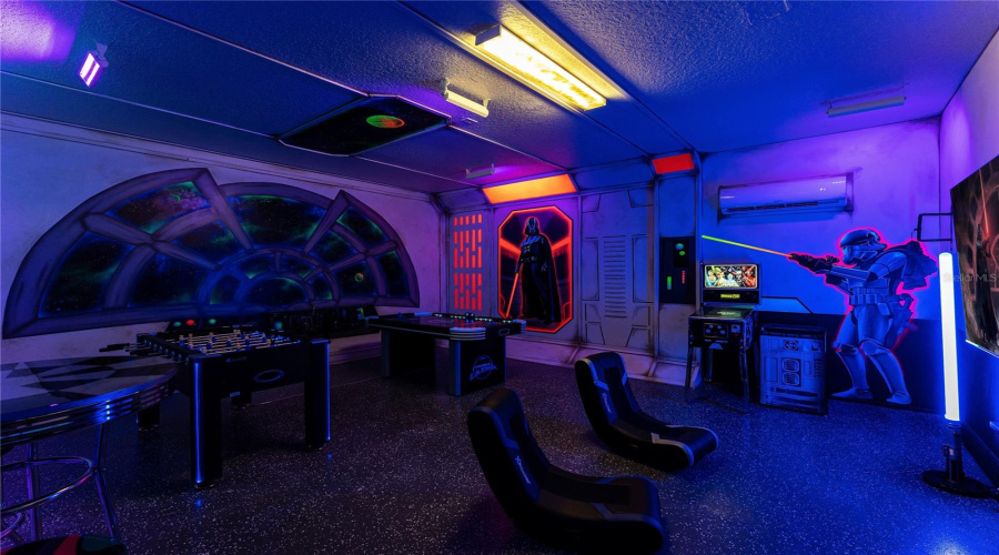 Star Wars Themed Garage Game Room With Black Light Reactive Effects