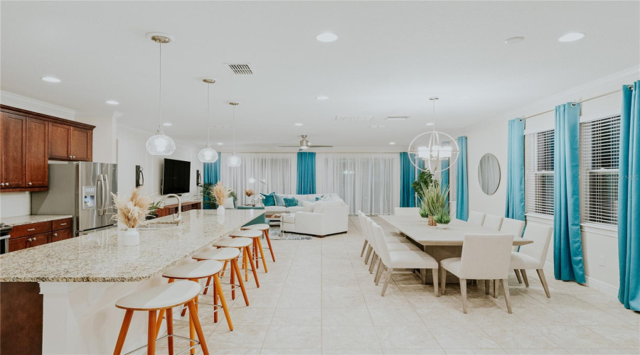 Modern Kitchen Dining And Living Room Combo With Teal Accents