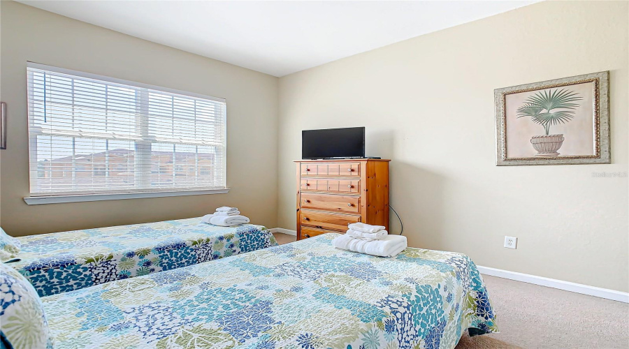 A Guest Room With Twin Beds.