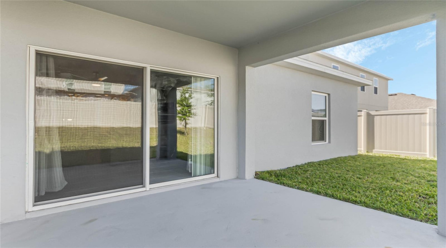 Patio And Large Sliding Glass Doors View