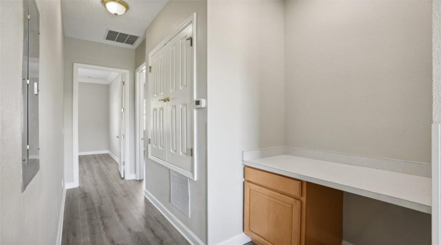 Upstairs Hallway With Built In Desk