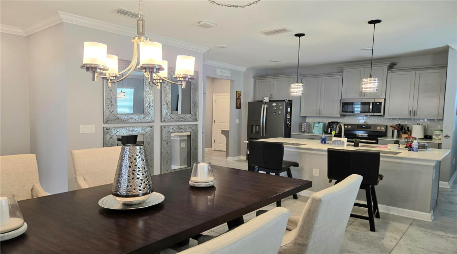 Elegant Light Fixtures In The Dinning And Kitchen Area