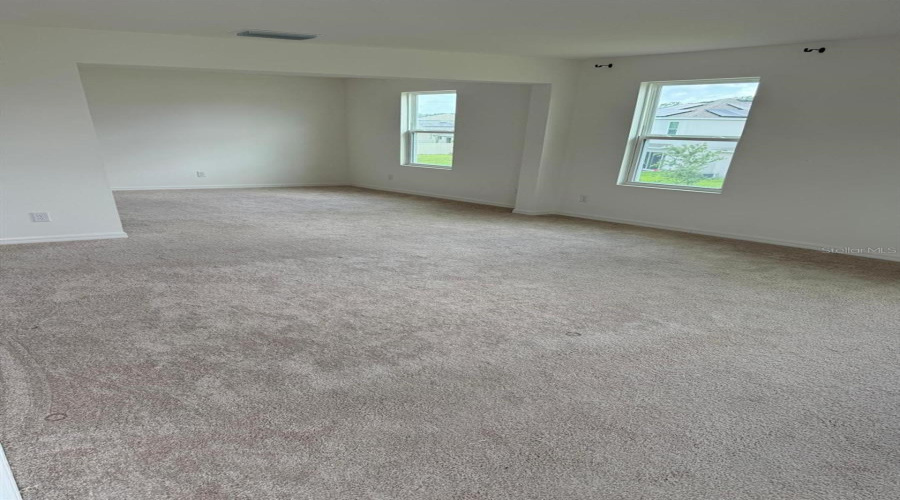 View Of The Sitting Area In Primary Bedroom