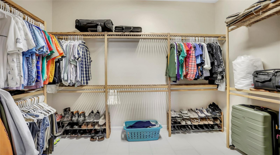 Primary Closet With System Organizer