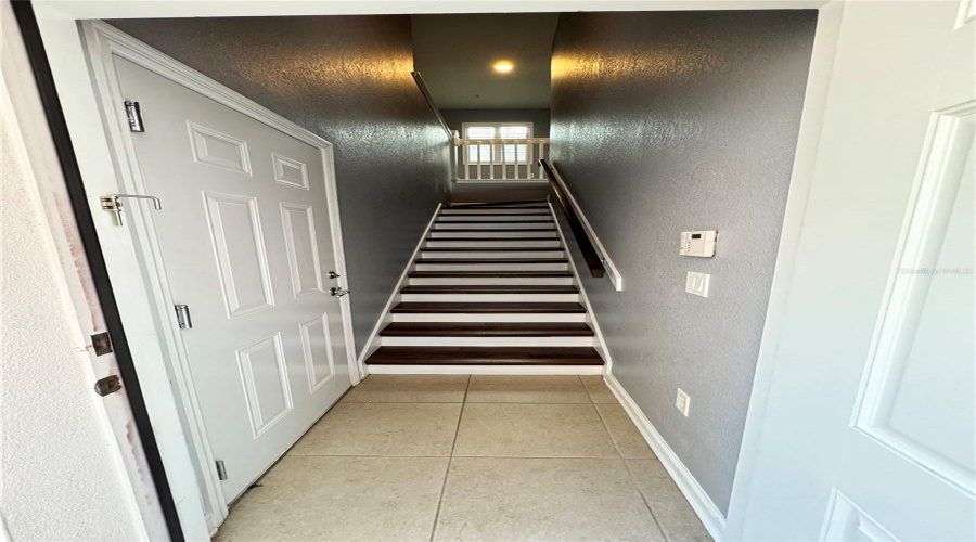 Entry Way Up To Living Area