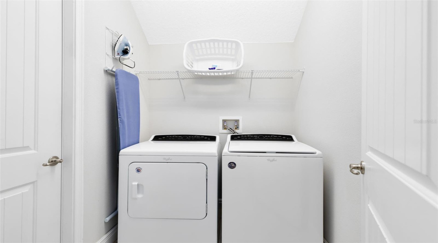 Laundry room located downstairs