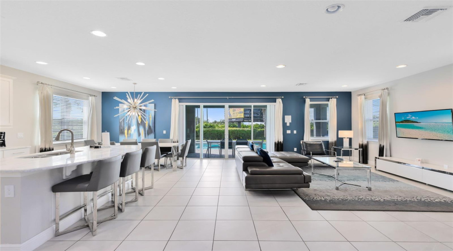 As you enter, kitchen is to the left, living room to the right.