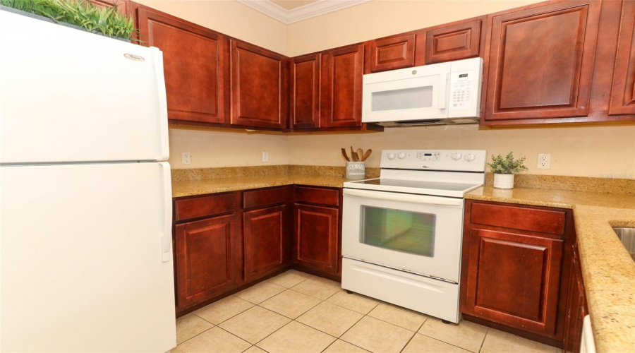 Granite Counter Tops...new Microwave.  Fridge Has Ice Maker