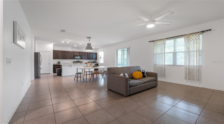 Open Living Room Connected To Kitchen