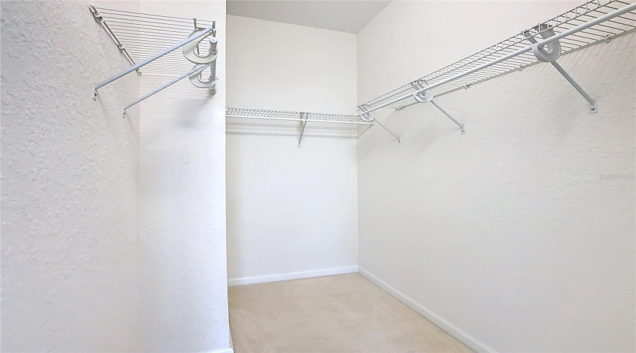 The Walk-In Closet In The Guest Bedroom.