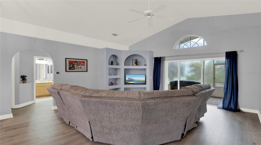 View Of Living Room With Split Floor Plan Additional Room Entry/ Hallway