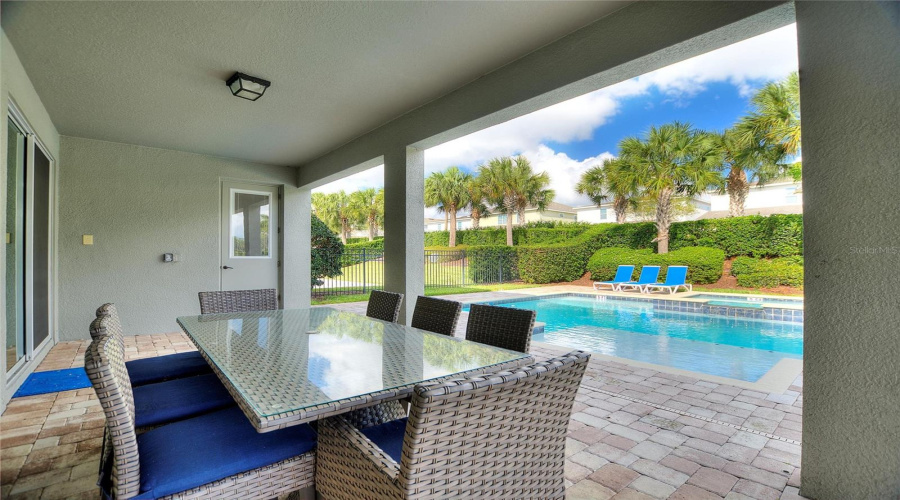 A View From The Lanai Showing The Door To The Half Bath.