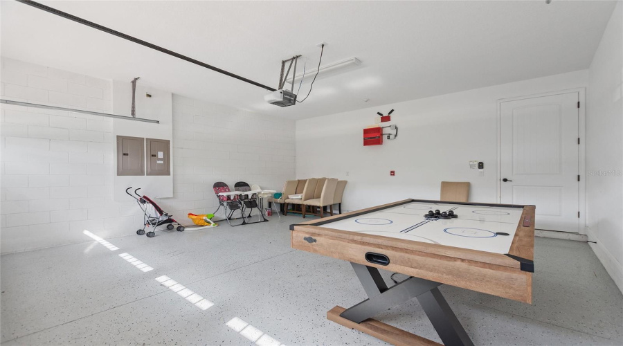 The Garage Has Plenty Of Room For Parking Or Convert It To Another Game Room.