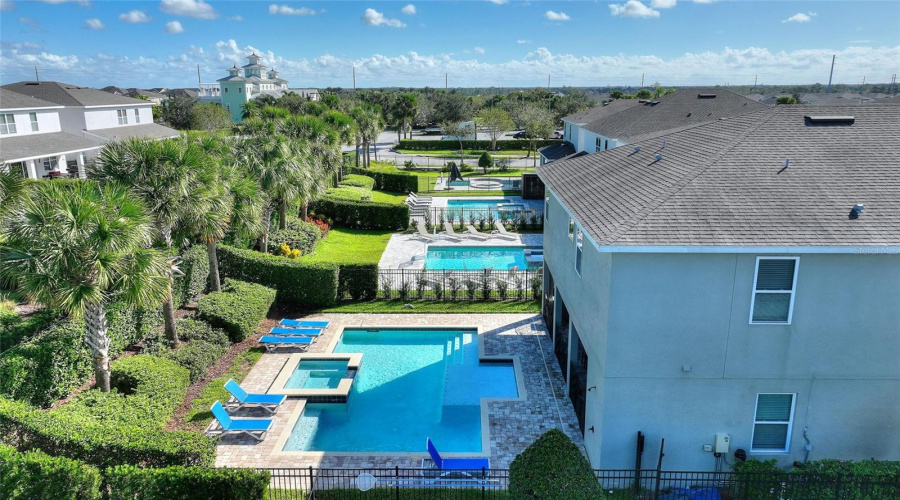 A Beautiful Sparkling Pool With A Sun Shelf And Spa Will Entice All To Take A Dip And Enjoy Every Minute Outdoors.