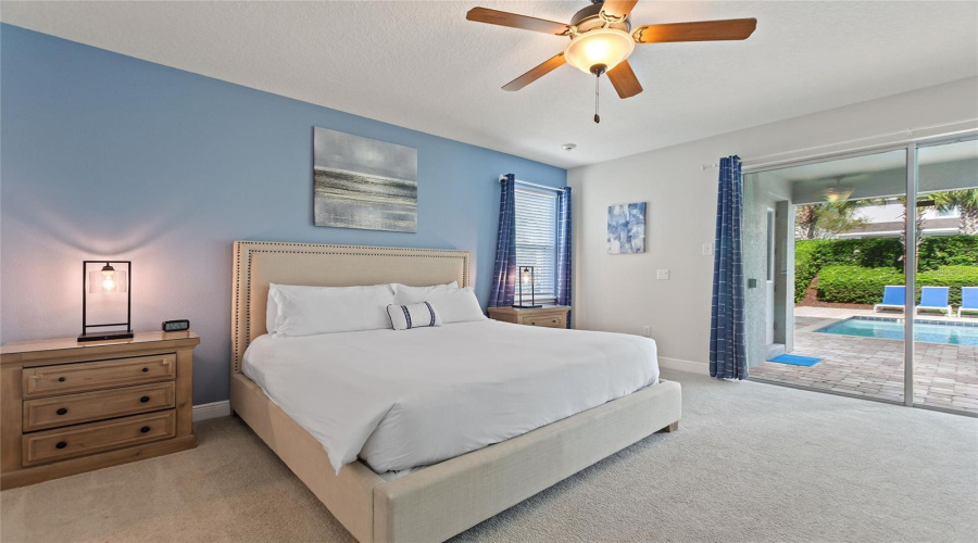 A Downstairs Bedroom With A Beautiful View Of The Pool. (17' X 15')