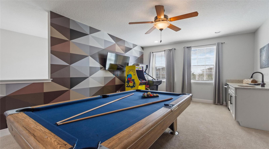 Between A Game Of Scrabble On The Wall, Pool, Or Video Games, Everyone Will Have Some Fun In This Bonus Room.