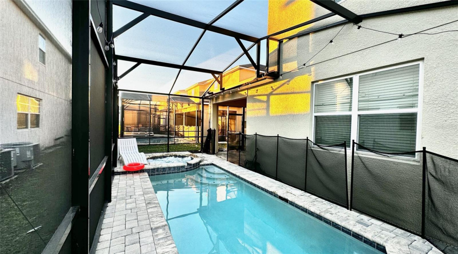 Outdoor Enclosed Pool And Spa Area