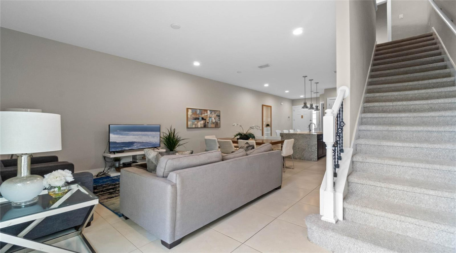 View Of The Staircase Leading To Three Bedrooms And 3 Full Bathrooms From The Great Room