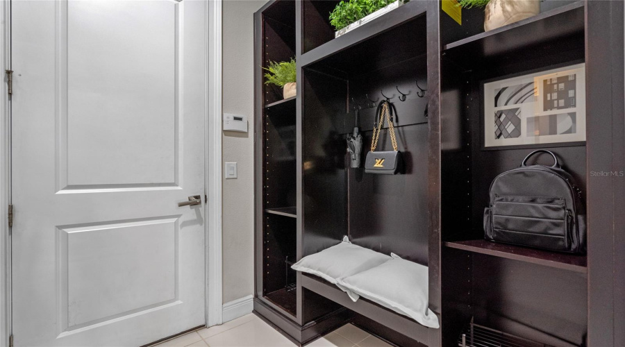 View Of First Floor Mudroom With Custom Storage.