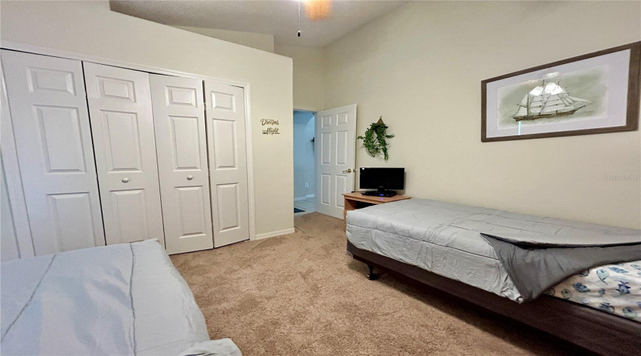 Pink Bedroom With 2 Single Beds.