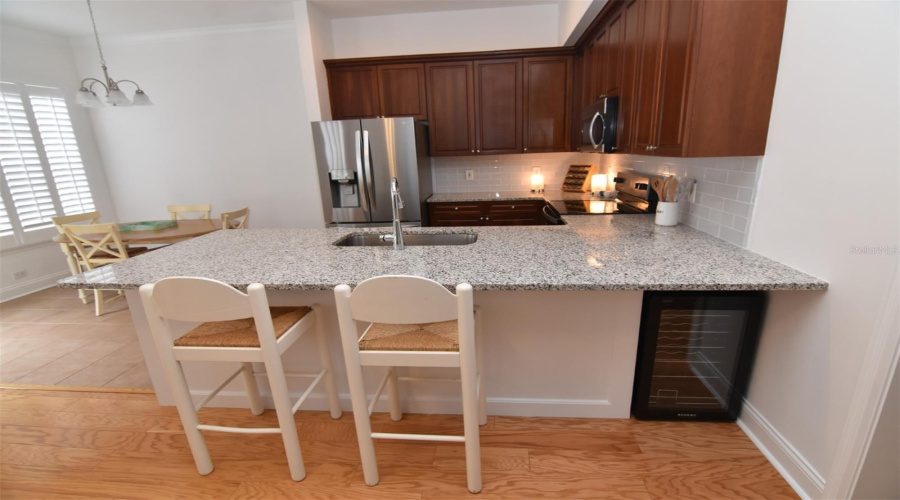 Kitchen With Wine Fridge &Amp; Breakfast Bar