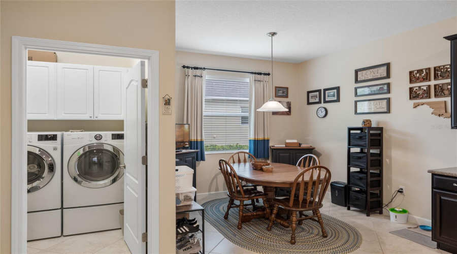 Breakfast Nook Showing The Laundry Area From The Kitchen