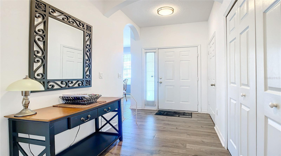 Hallway With Half Bath And Laundry Closet To The Right