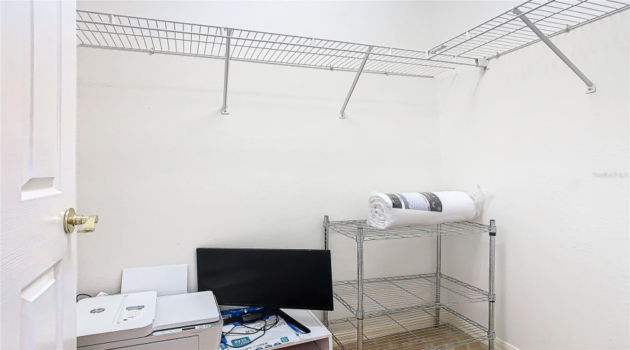 The Walk-In Closet In The Primary Bedroom.