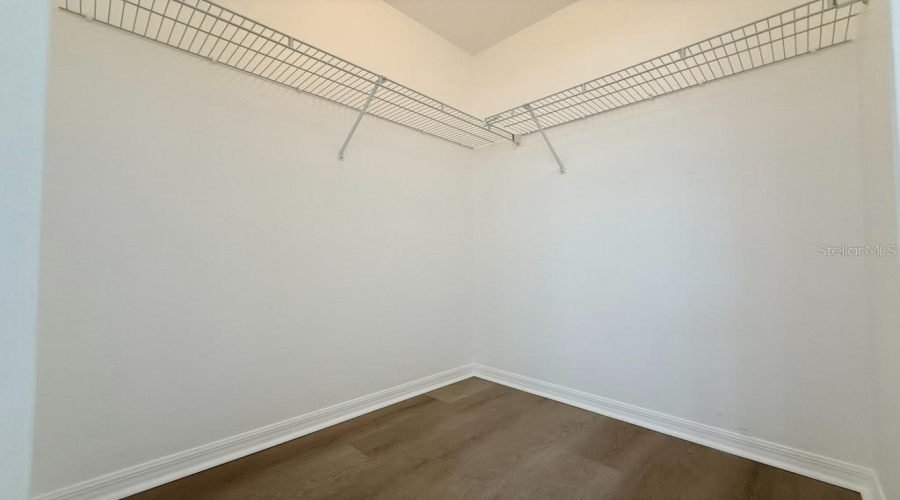 1 Of 2 Walk-In Closets In Primary Bath.