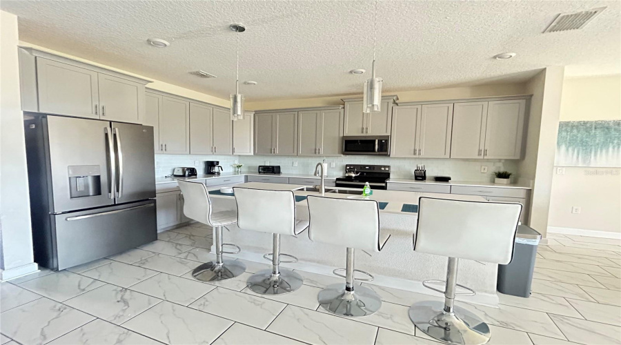 DAVENPORT, Florida 33896, 6 Bedrooms Bedrooms, ,5 BathroomsBathrooms,Residential,For Sale,CABOT CLIFFS,0,MFRS5116247