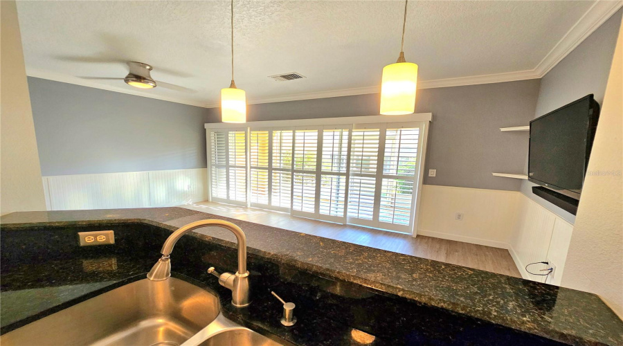 Breakfast Bar Looking Into Dining Room And Living Room