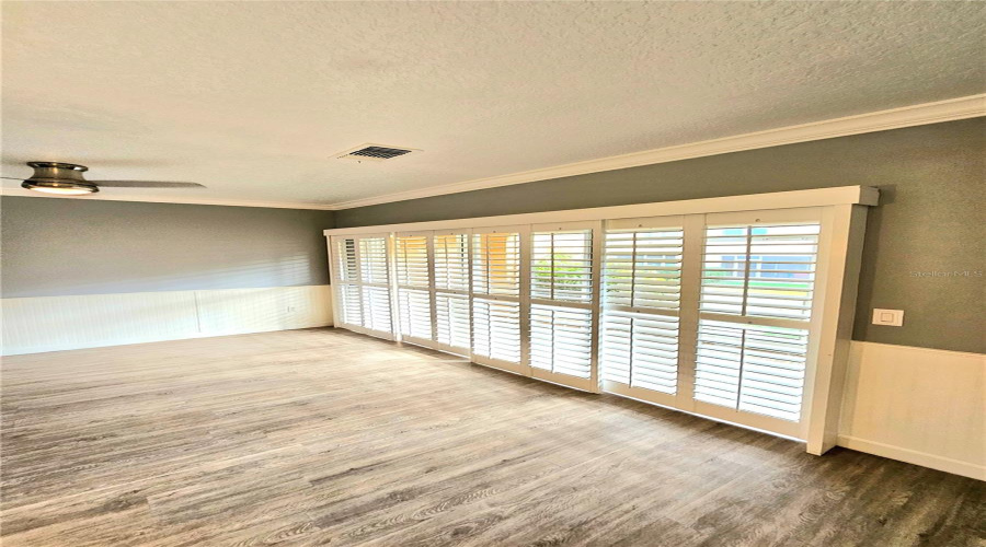 Wood Shutters Leading  To The Lanai