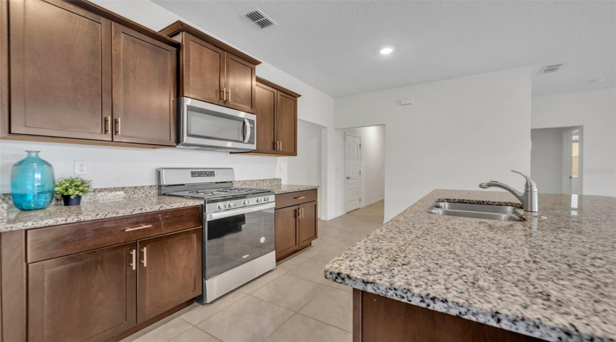 Davenport, Florida 33837, 6 Bedrooms Bedrooms, ,5 Bathroomsbathrooms,Residential,For Sale,Oak Reflection Loop,Mfro6264655