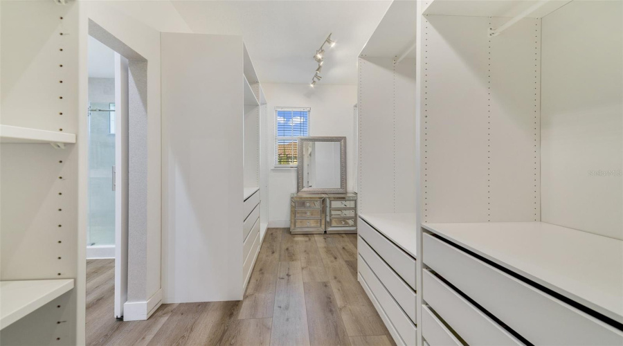 Primary Suite Walk-In Closet Has Custom Built-Ins!