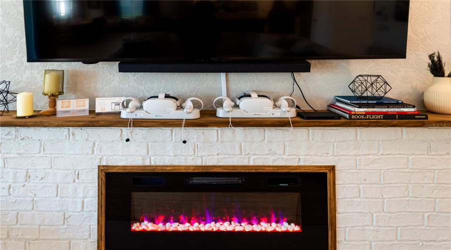 Fireplace And Vr Headsets In Living Room