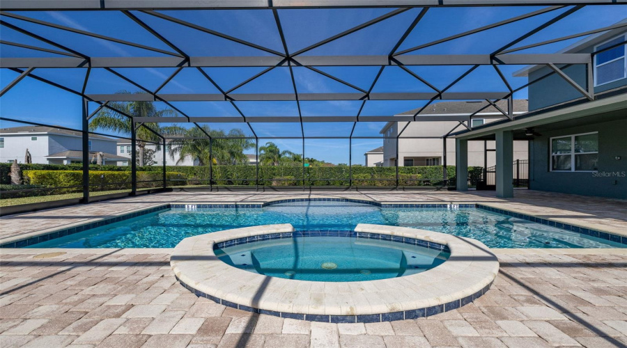 Extended Paved Pool Deck With Cage