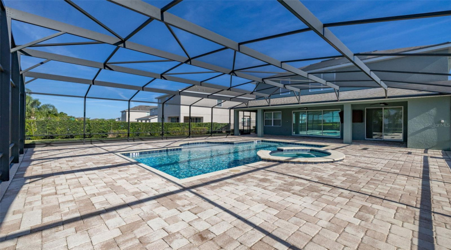 Extended Paved Pool Deck With Cage