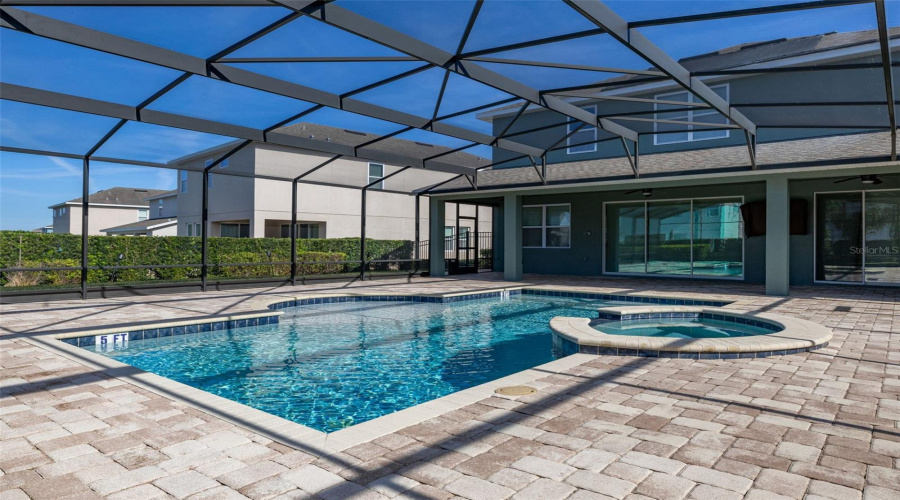 Extended Paved Pool Deck With Cage