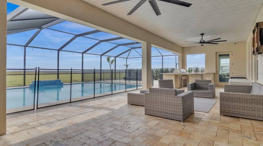 Rear enclosed porch with pool