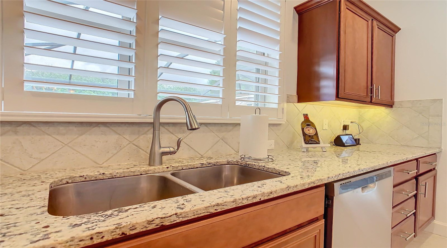 Sunlit Kitchen With Plantation Shutters