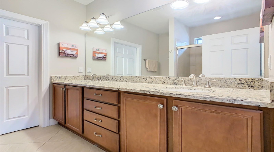 Primary Bathroom Double Sinks-Walk-In Closet