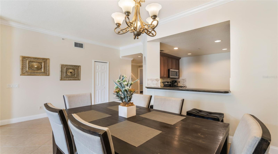 Formal Dining Room Space With Adjacent Kitchen