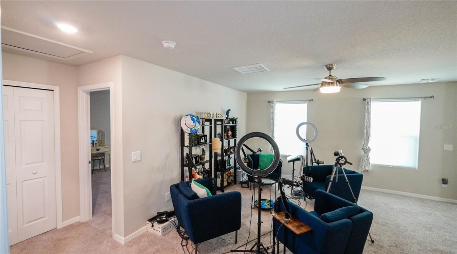 Another View Of The Loft, Showing Off The Natural Light From The Large Windows.