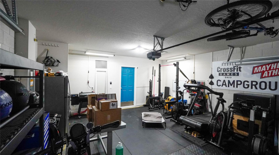 The Two Car Garage Area (Or, In This Case, A Nice Large Workout Area!).