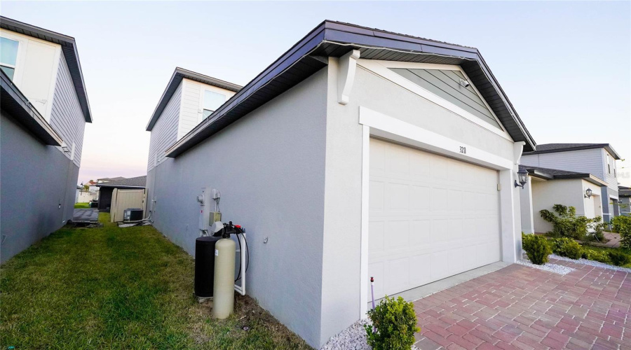 The Left Side Of The House Showing The Whole House Water Unit.