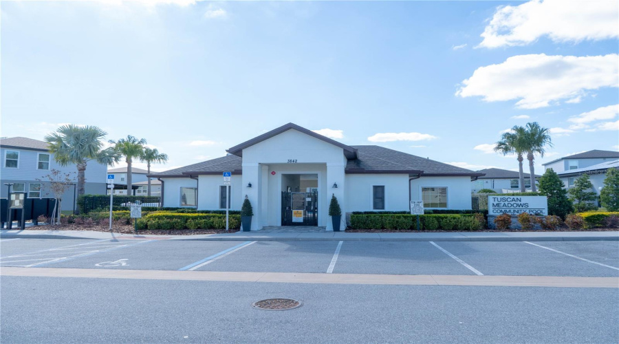 Front View Of The Community Pool Area And Location Of The Mailboxes Is To The Left.